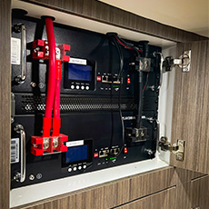 Dual lithium battery pack with red power cables and integrated screen readouts