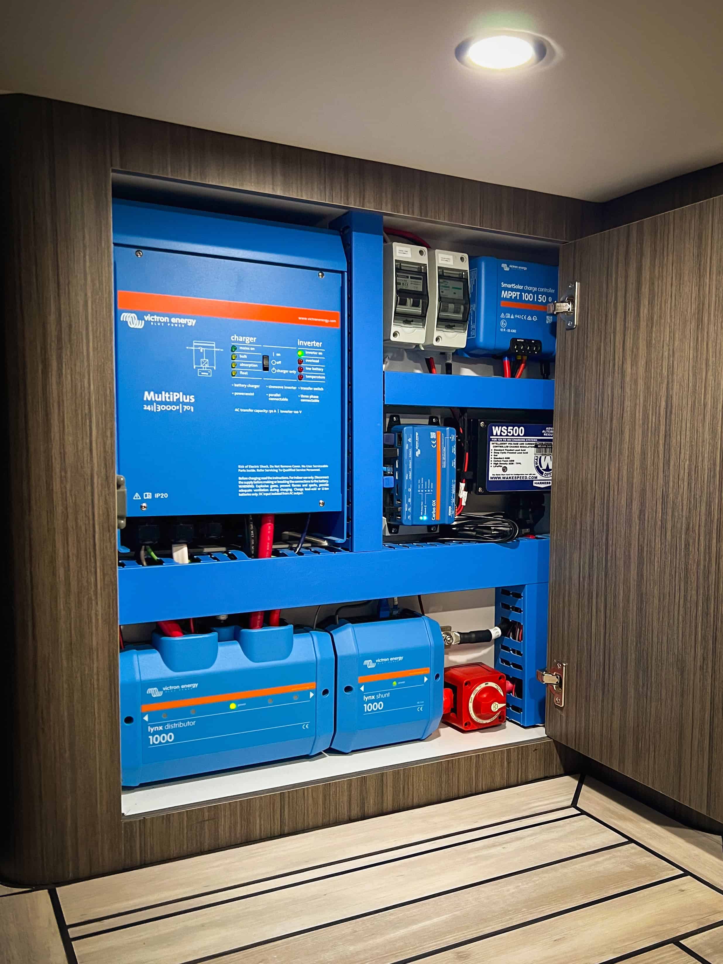 Victron-based power system cabinet with inverters, chargers, and wiring neatly arranged