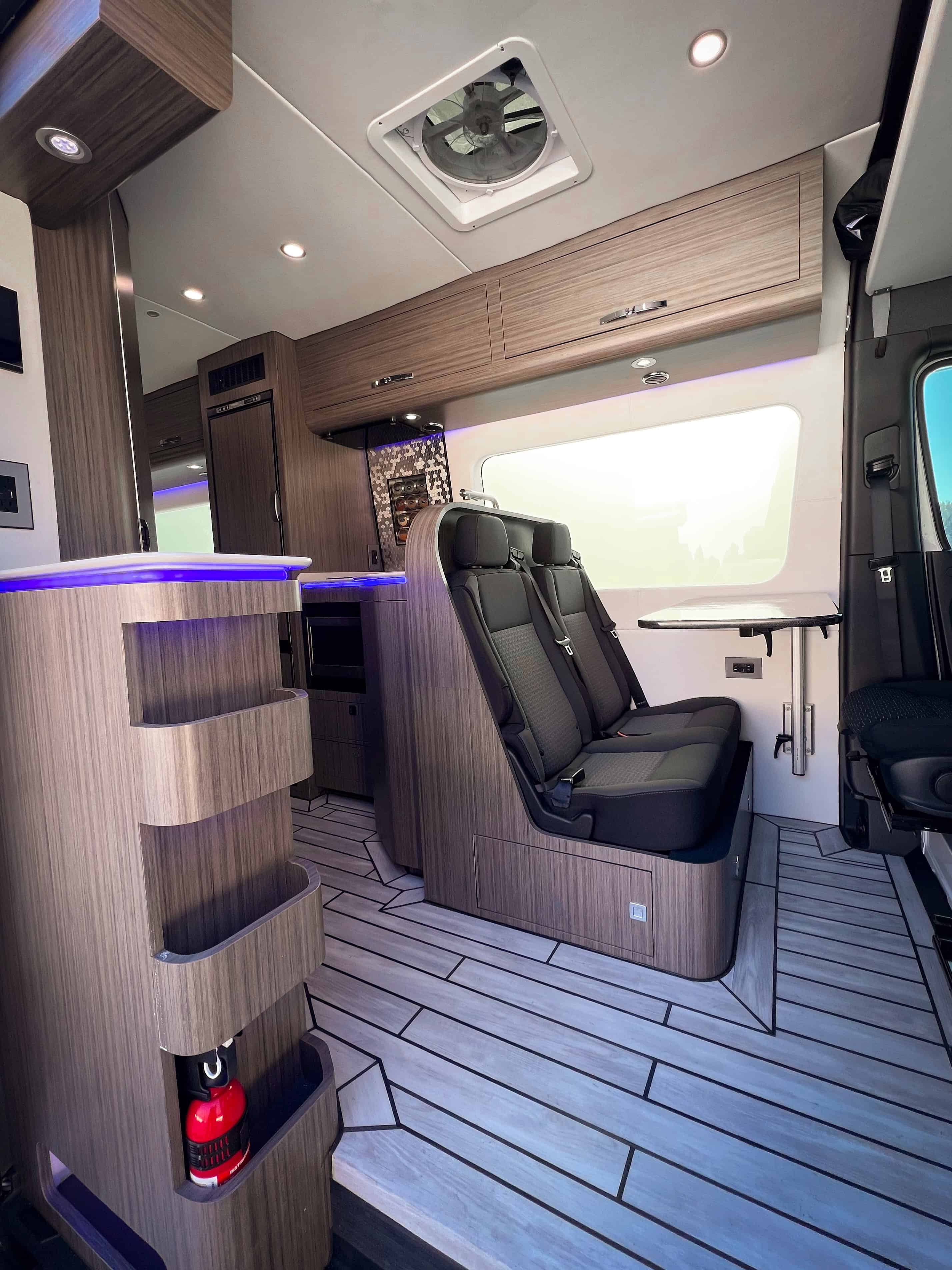 Cabin view showing seating, flooring, cabinetry and marine finishes
