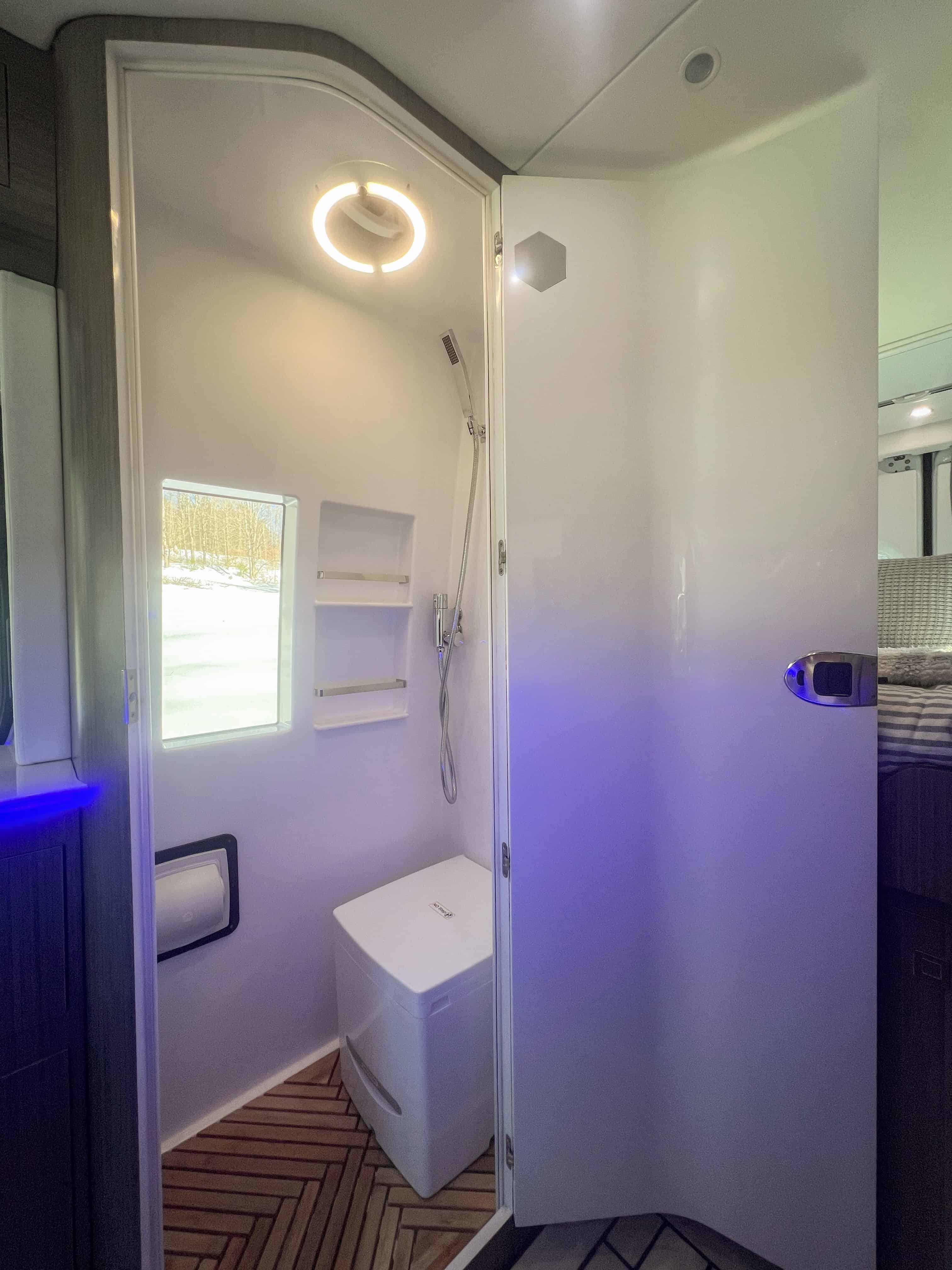 Camper van wet bath with composting toilet and marine flooring