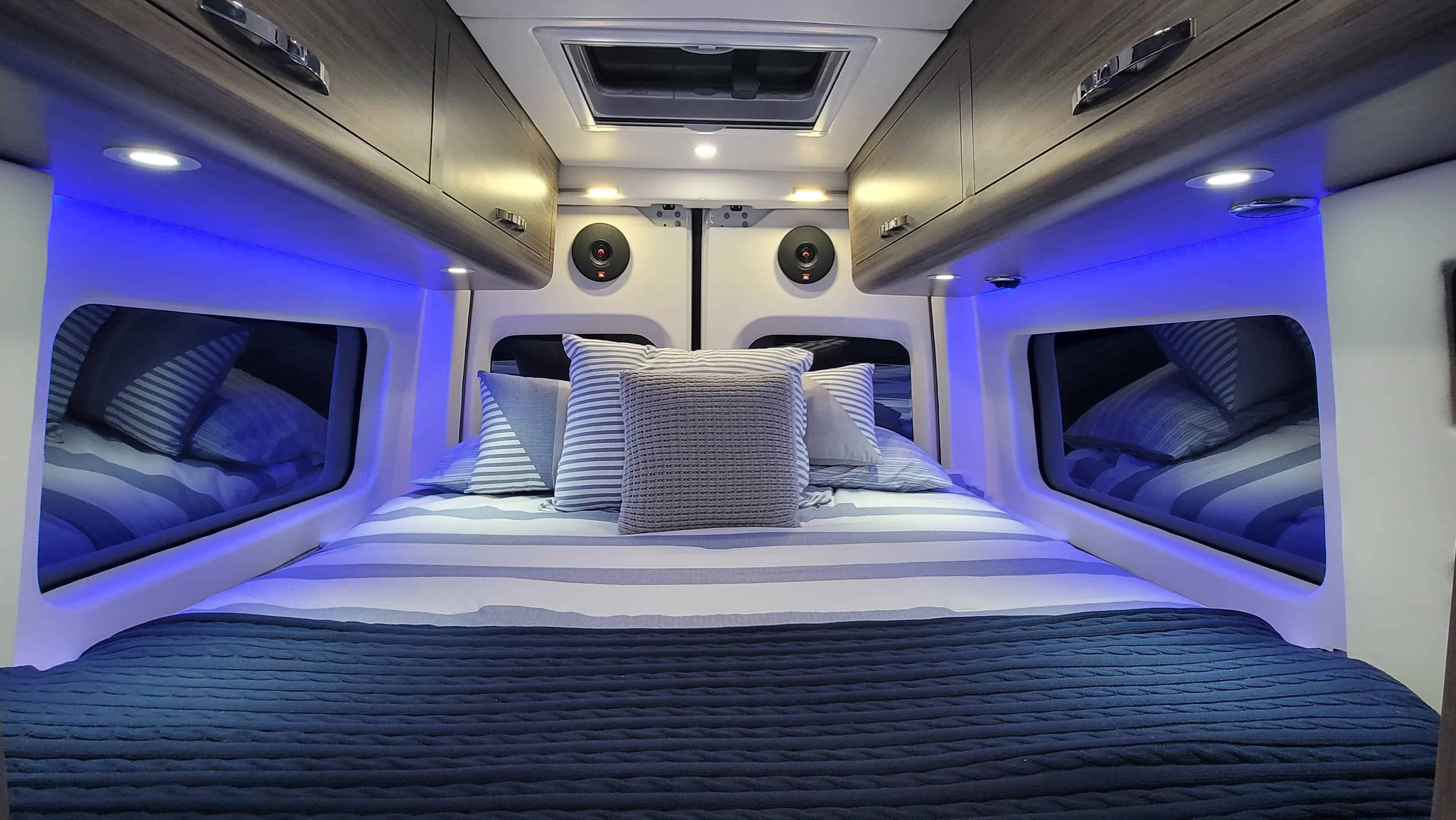 Rear bed with overhead storage, LED lighting, and reading lights